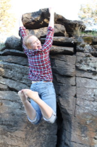 ari climbing rock